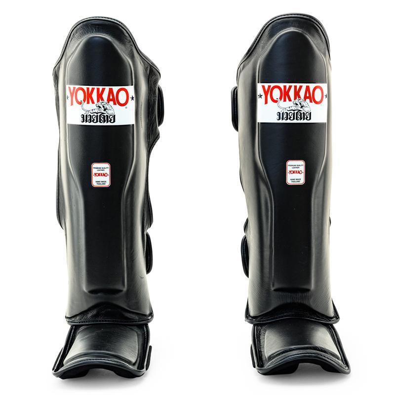 Black shin guards for Muay Thai